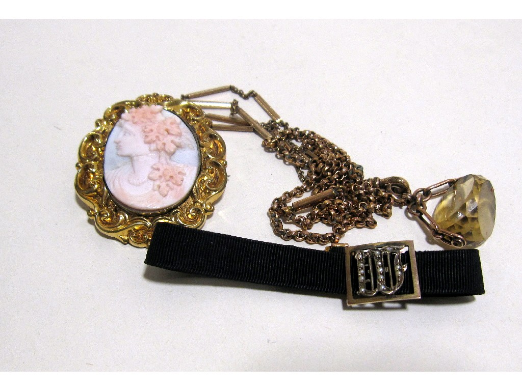 Appraisal: Lot comprising gold mounted cord mourning bracelet cameo brooch revolving