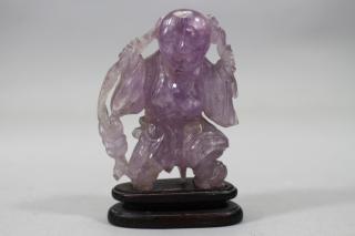 Appraisal: Antique Chinese Carved Amethyst Figure on Stand Antique Chinese Carved