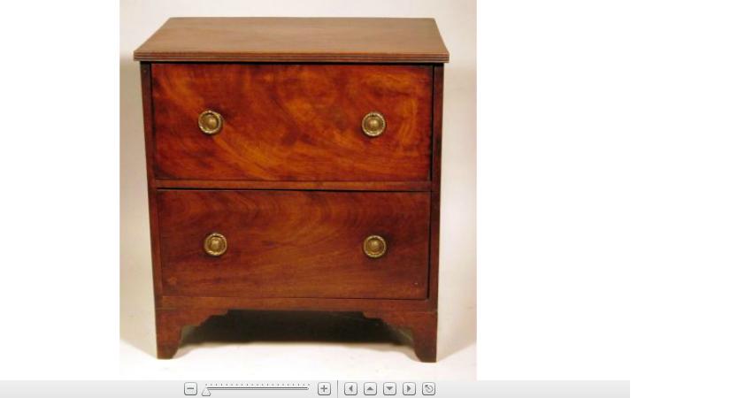 Appraisal: George III mahogany commodeThe reeded rectangular top over two short