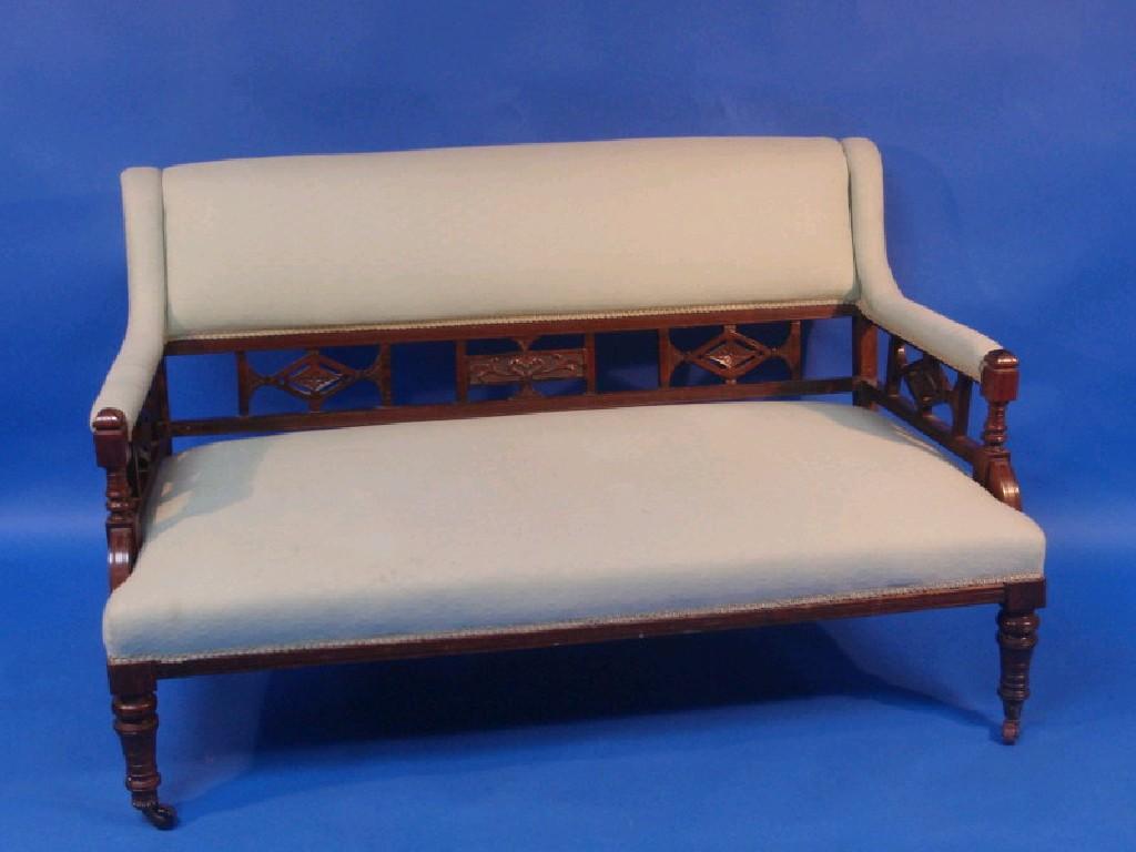 Appraisal: A thC Victorian rosewood drawing room settee the upholstered back