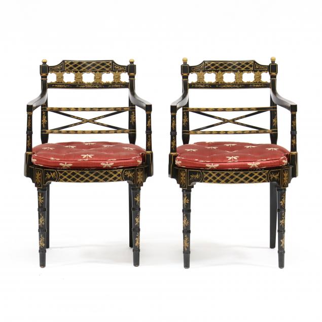 Appraisal: PAIR OF REGENCY STYLE EBONIZED AND GILT ARMCHAIRS Late th