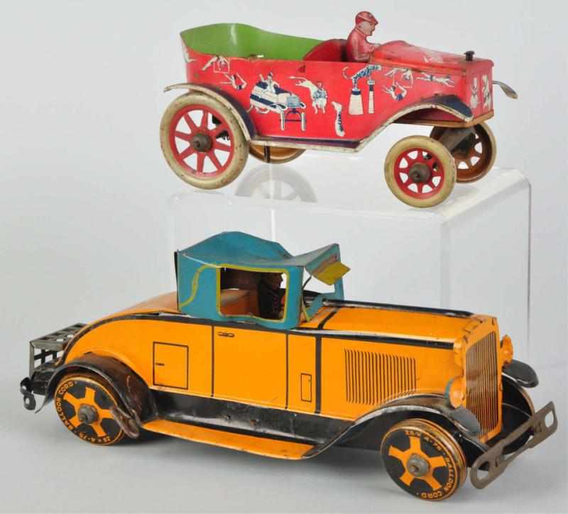 Appraisal: Lot of Tin Litho Automobile Wind-Up Toys American Working Includes