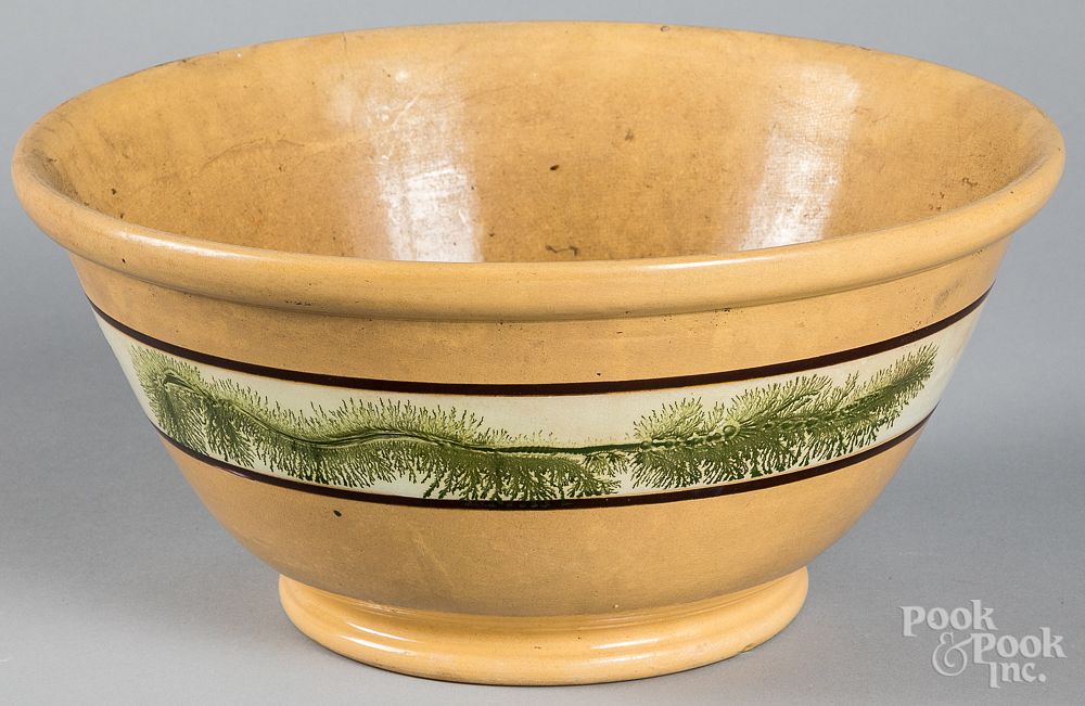 Appraisal: Large yellowware mixing bowl Large yellowware mixing bowl with seaweed