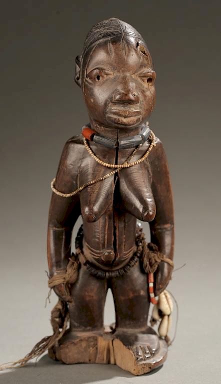 Appraisal: Yoruba Ibeji female figure first half th c An Ibeji