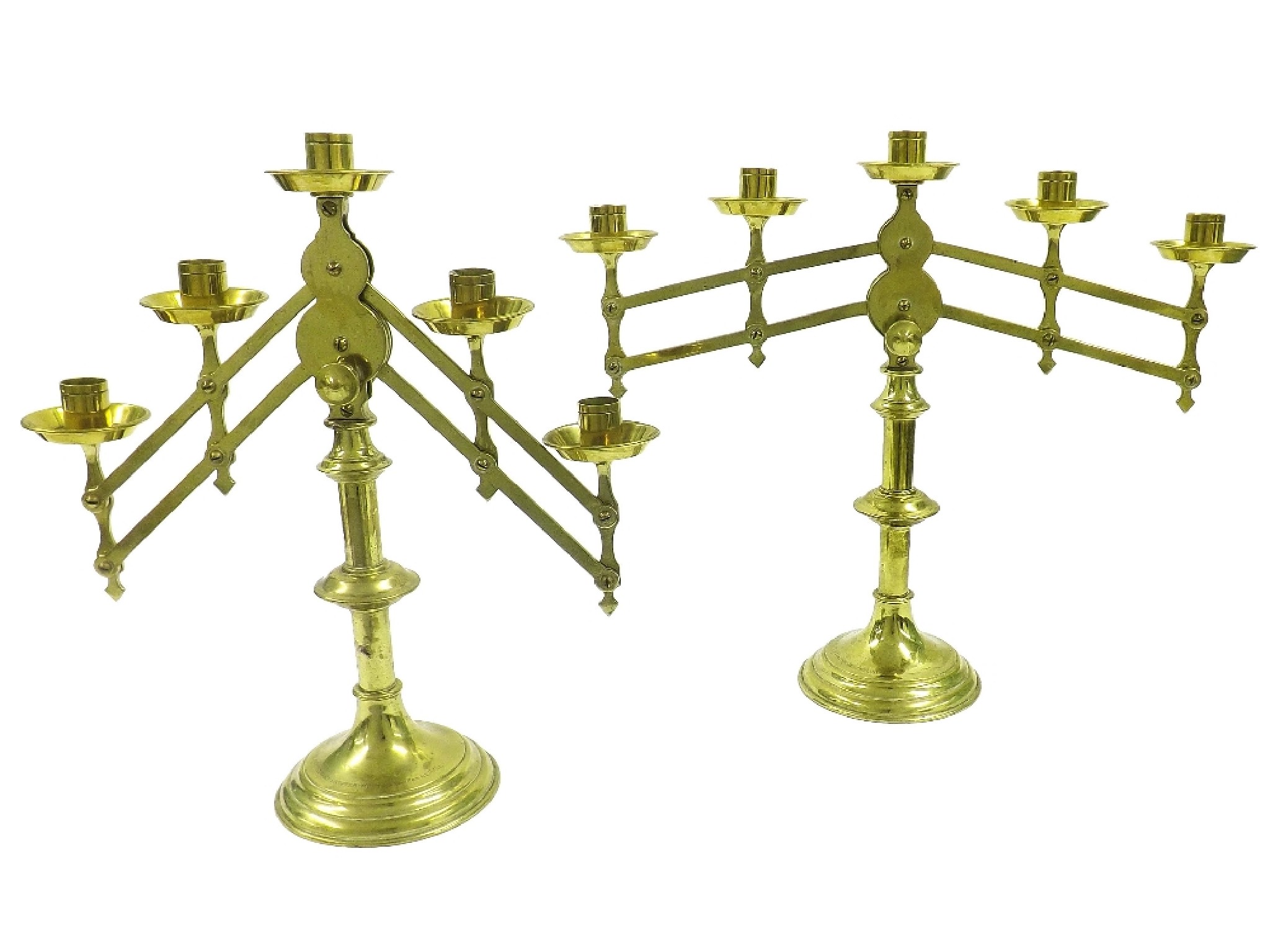 Appraisal: Matched pair of brass five branch Menorah with concertina branches