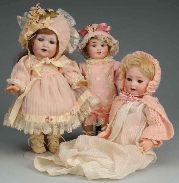 Appraisal: Lot of German Bisque Character Dolls Description Revalo sleeping eyes