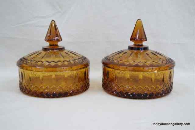 Appraisal: Vintage Tiara Amber Glass Candy Dishes w LidsFrom c 's