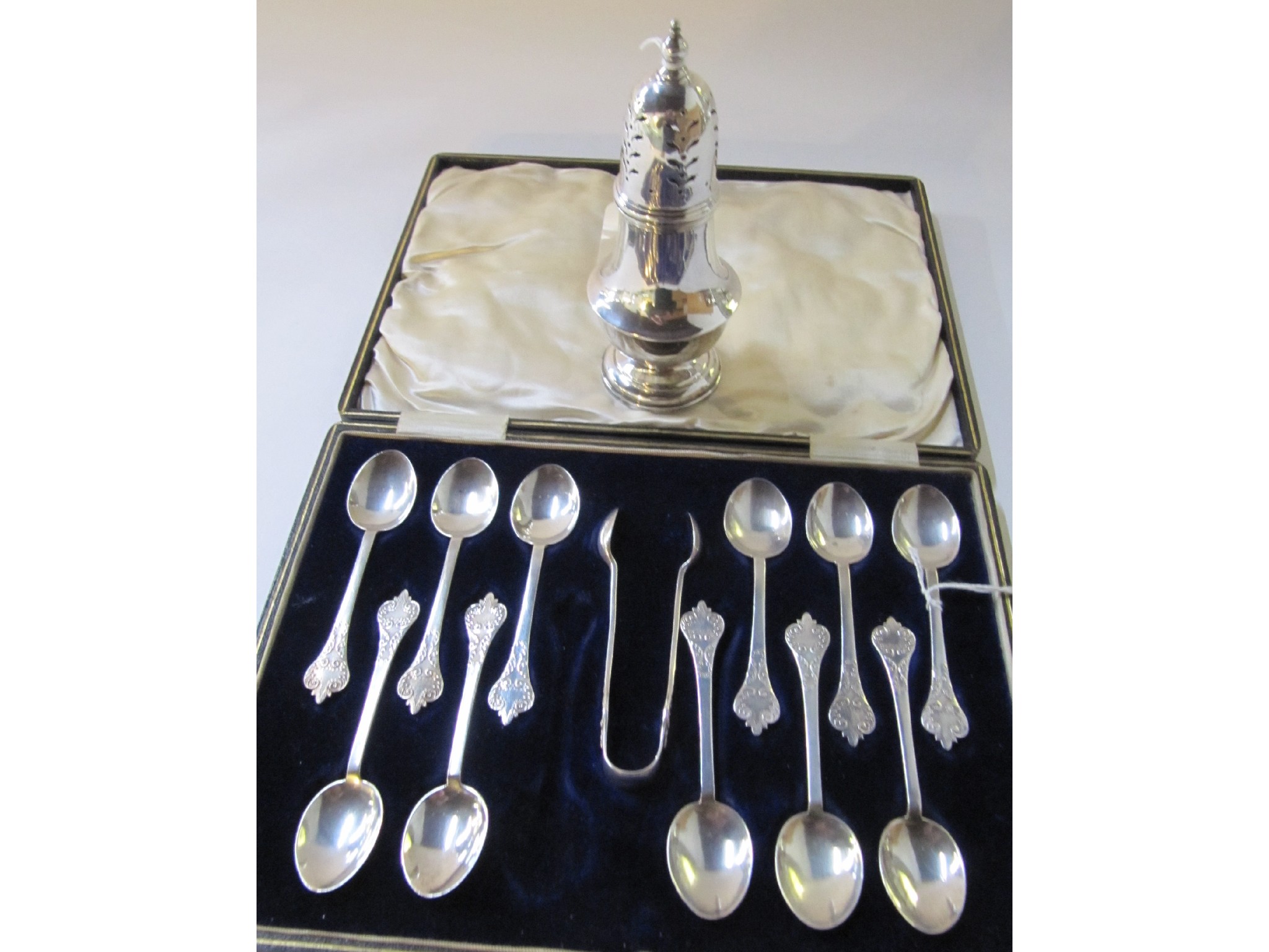 Appraisal: A lot comprising a part set of eleven silver teaspoons