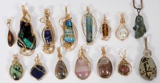 Appraisal: FIFTEEN WIRE GOLD AND STONES PENDANTS FIFTEEN WIRE GOLD AND