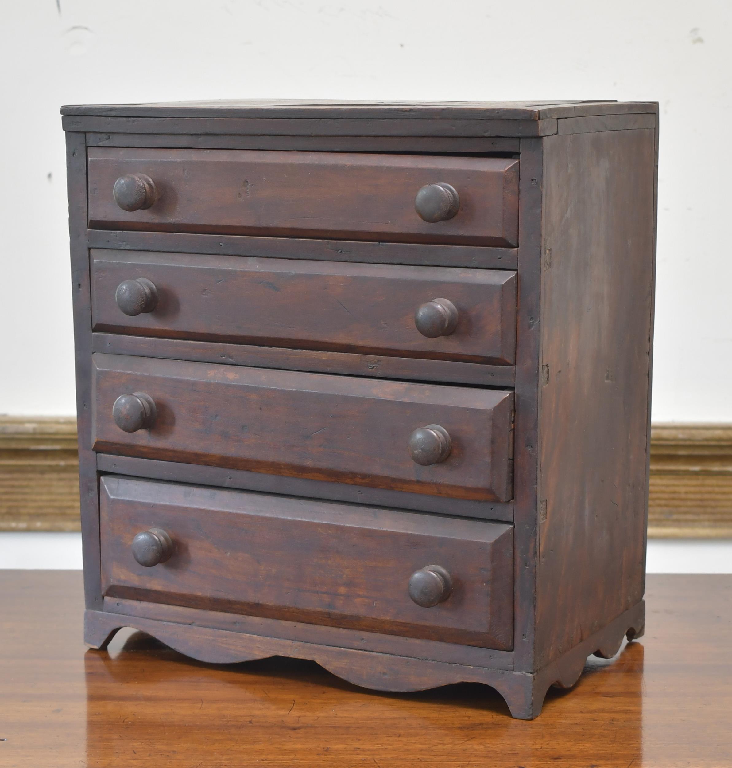 Appraisal: TH C MINIATURE CHERRY CHEST WITH HISTORY A mid- th