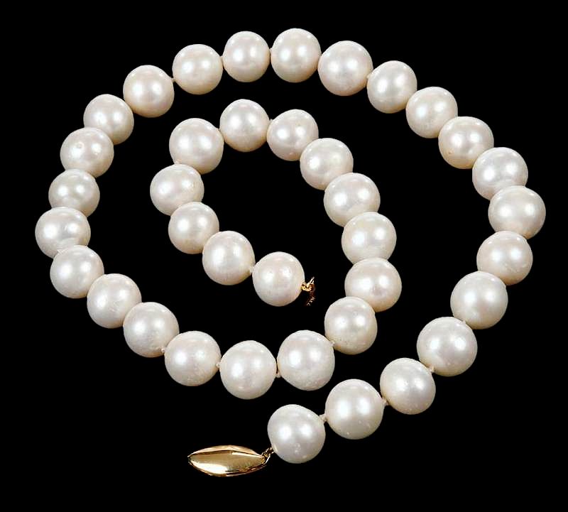 Appraisal: Pearl Necklace knotted slightly off round pearls approx mm each