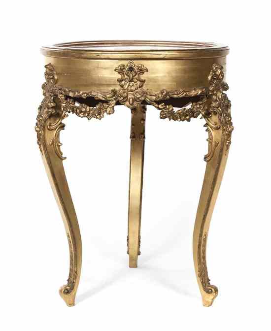 Appraisal: A Louis XV Style Giltwood Vitrine Table the circular top