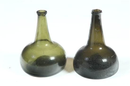 Appraisal: TWO BOTTLES European th century blown glass Onion shaped in