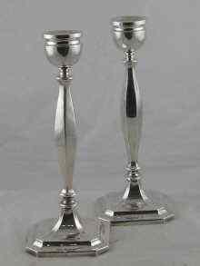 Appraisal: A pair of silver candlesticks Birmingham