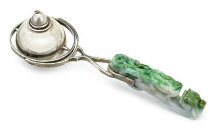 Appraisal: Chinese mottled green jadeite garment hook mounted lightermarked sterling gump