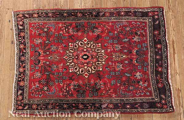 Appraisal: A Hamedan Rug the central cartouche in bright pink light