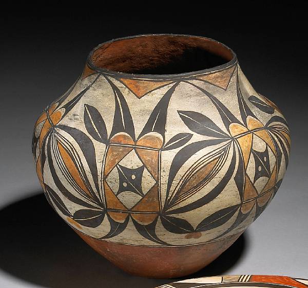 Appraisal: An Acoma polychrome jar With an allover pattern of stylized