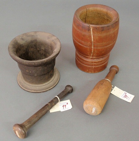 Appraisal: Two mortars pestles- one cast iron and one wood