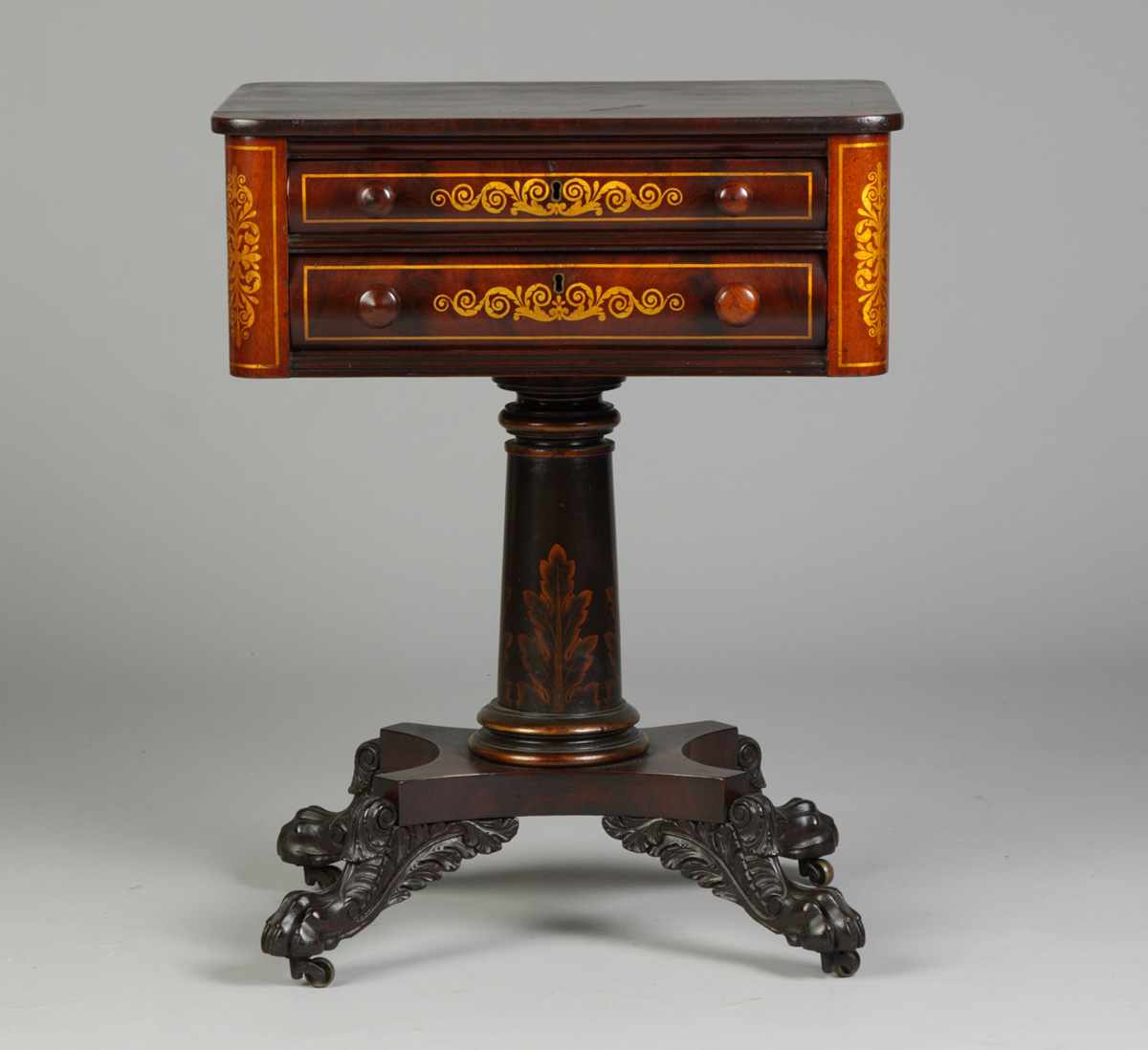 Appraisal: Classical -Drawer Mahogany Sewing Stand Carved paw feet Original stenciling