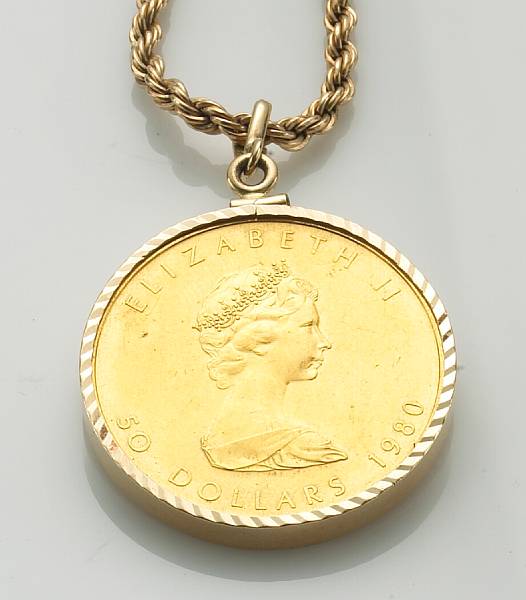 Appraisal: A Canadian gold coin and k gold pendant with k