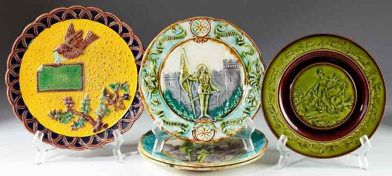 Appraisal: Five th century Pictorial Majolica Platesincluding a rare ''Merry Xmas