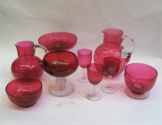 Appraisal: NINE PIECES CRANBERRY AND CLEAR GLASS pitchers with clear applied