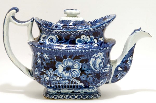 Appraisal: Staffordshire blue transfer teapot Overall floral decoration with baskets to