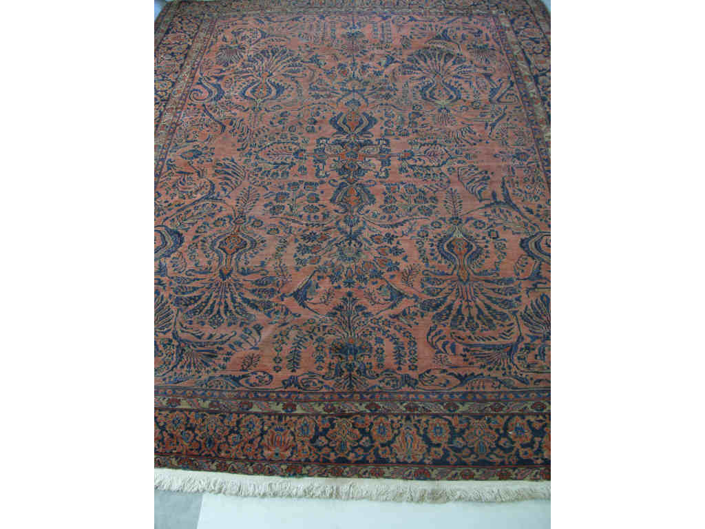 Appraisal: Persian Medallion Carpet Room-Size Sarouk s pleasing rose red field