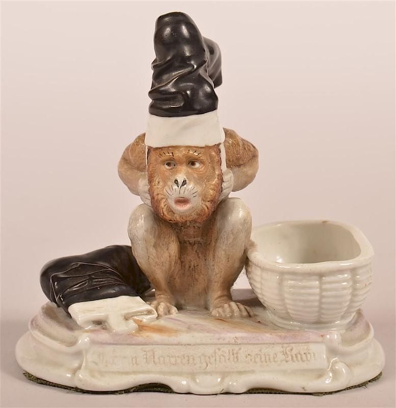 Appraisal: German Bisque Monkey Figural Match Safe th Century German Bisque