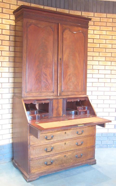 Appraisal: A George III mahogany Bureau Cabinet with Greek key and