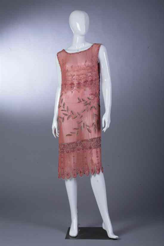 Appraisal: EMBELLISHED SALMON COLORED FLAPPER DRESS s Chiffon shift extensively embellished