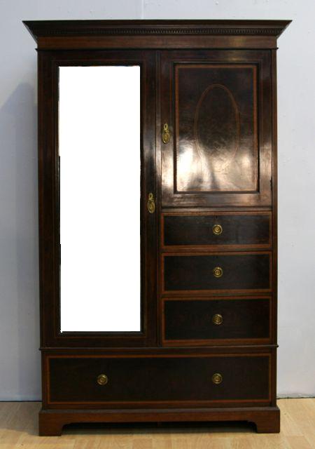 Appraisal: A Victorian mahogany and satinwood cross-banded mirror door wardrobe in