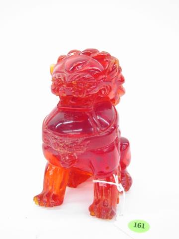 Appraisal: Cherry amber foo dog measuring tall