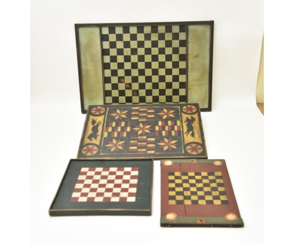 Appraisal: Four reproduction paint decorated game boards largest x Condition Good