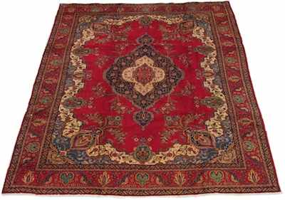 Appraisal: A Persian Tabriz Carpet Apprx '- x '- Low wool