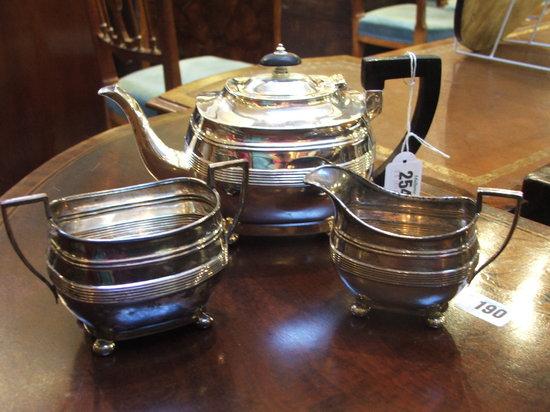 Appraisal: A SILVER THREE PIECE TEA SET oval tea pot with