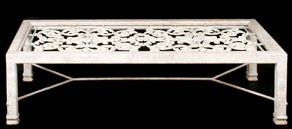 Appraisal: A wrought and cast metal paint decorated low table height