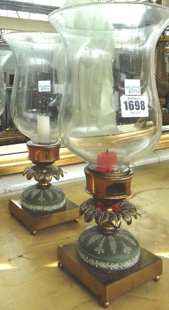 Appraisal: A pair of brass hurricane lamps early th century with