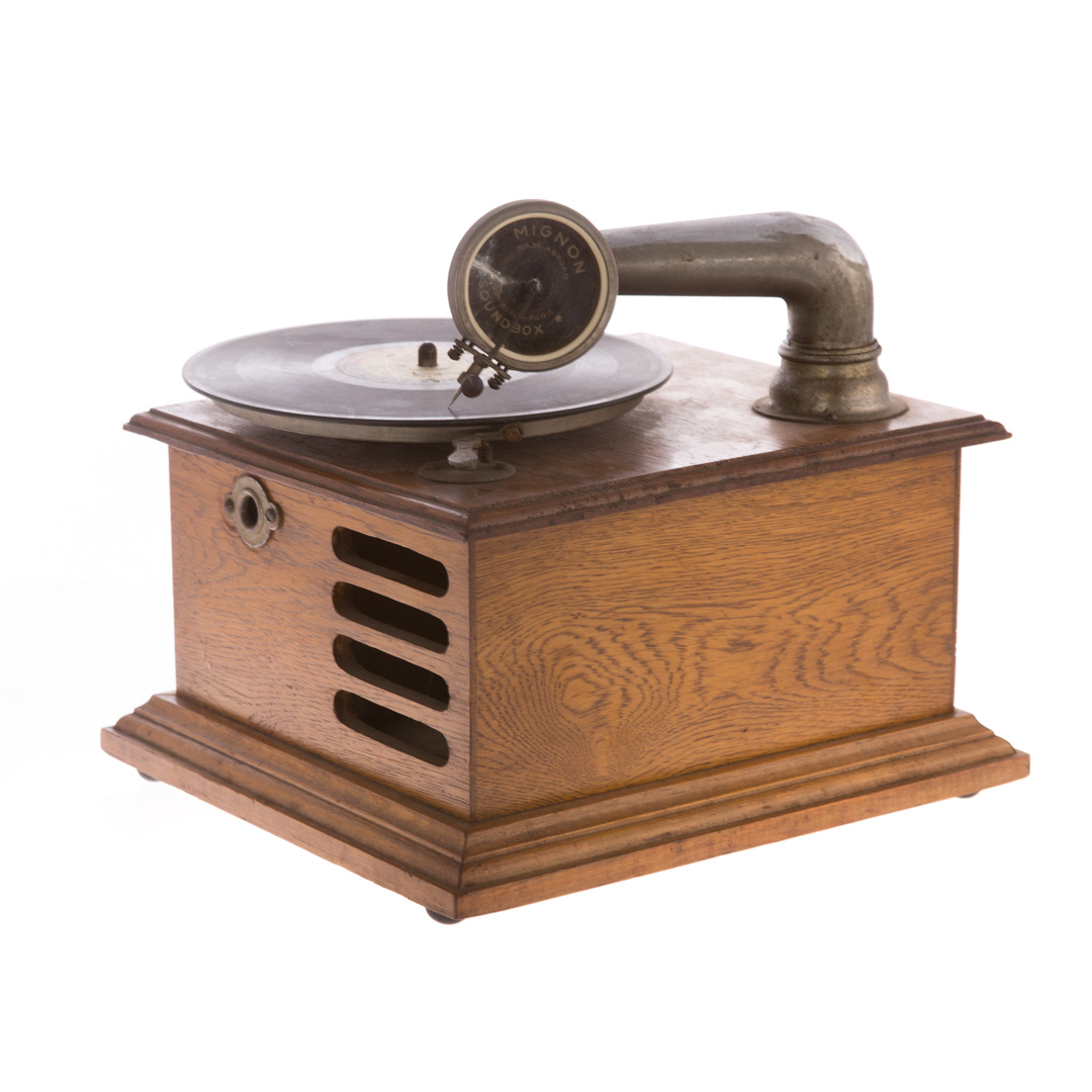 Appraisal: Mignon small portable phonograph circa s oak case in turntable