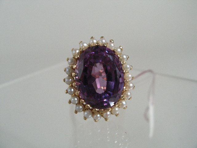 Appraisal: Ladies Ring K purple gemstone probably alexandrite faceted cut surrounded