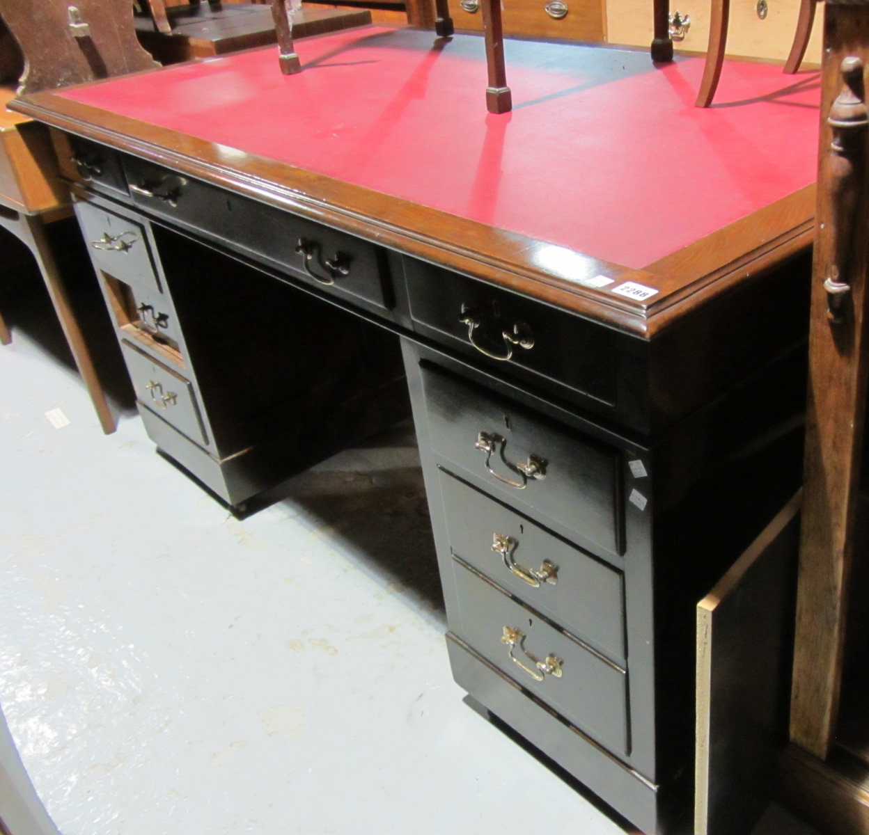 Appraisal: A th century mahogany pedestal desk with inset red leather