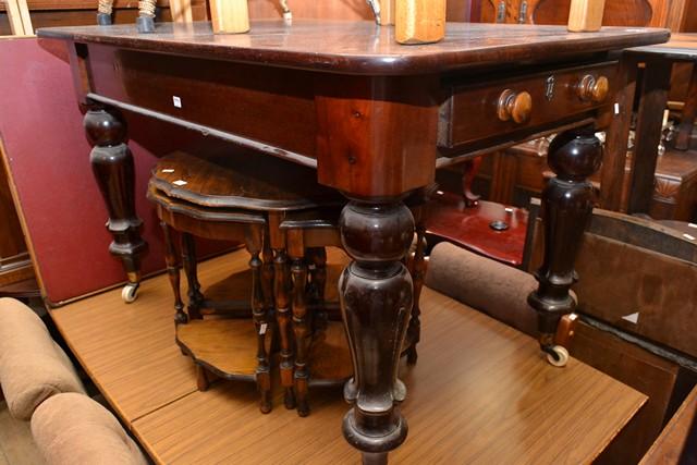 Appraisal: A VICTORIAN TABLE ON CASTORS WITH DOUBLE ENDED DRAWERS A