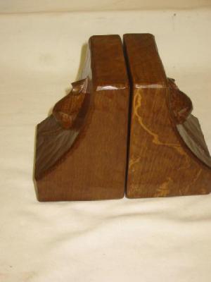 Appraisal: A PAIR OF ADZED OAK BOOK ENDS by Robert Mouseman