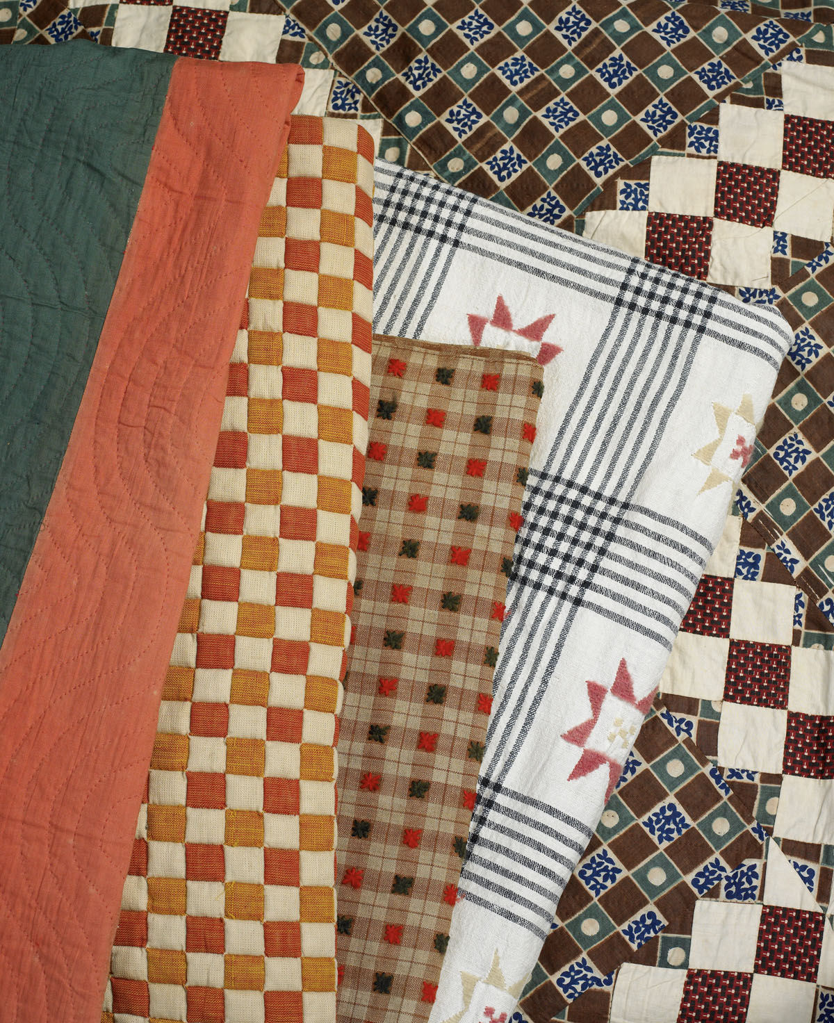 Appraisal: TWO PENNSYLVANIA CHECKERED COVERLETS WITH EMBROIDERED STARS The first in