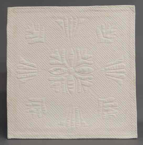 Appraisal: th c all white crib quilt with abstract floral design