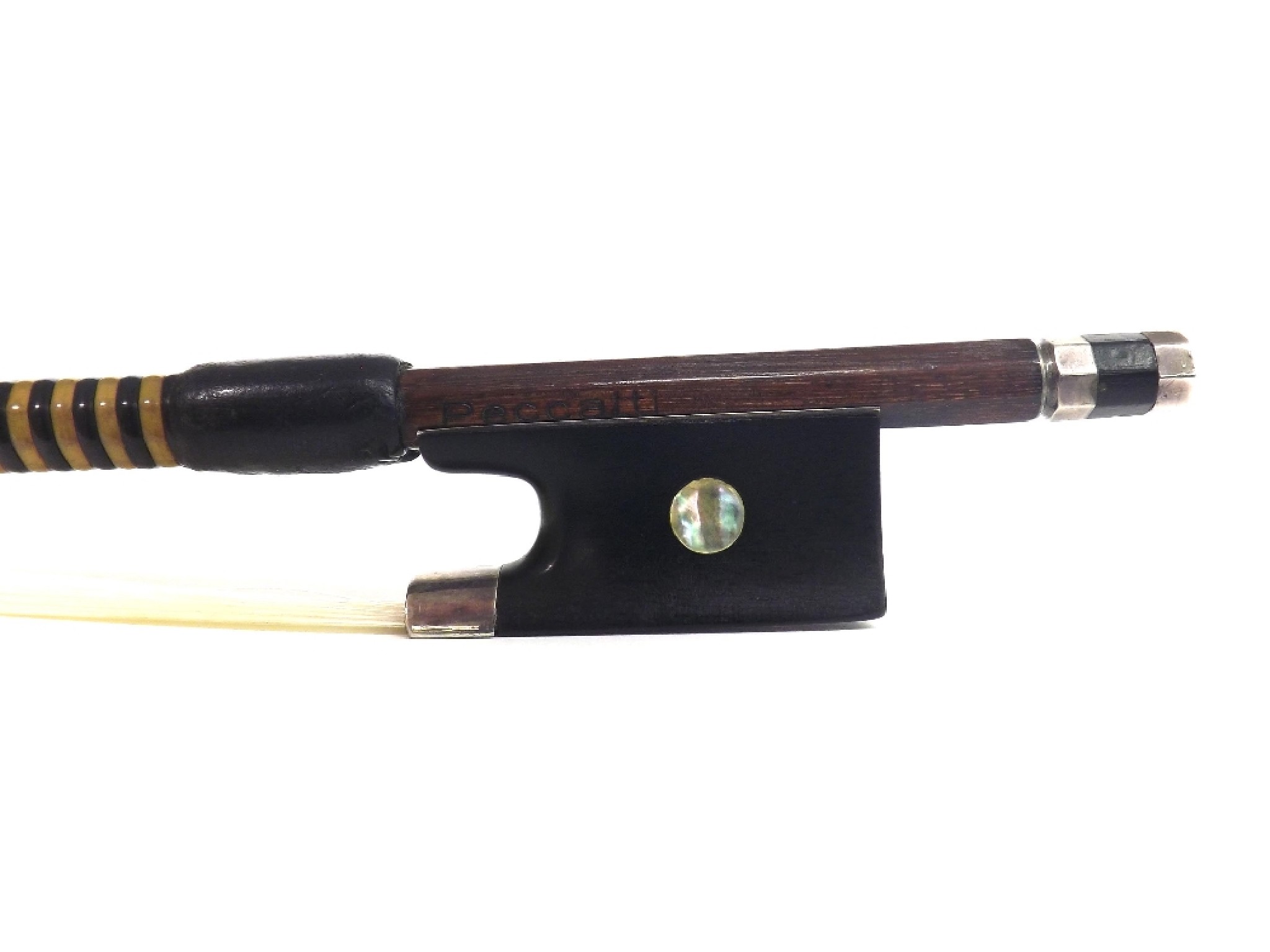 Appraisal: Silver mounted violin bow stamped Peccatte the stick round the