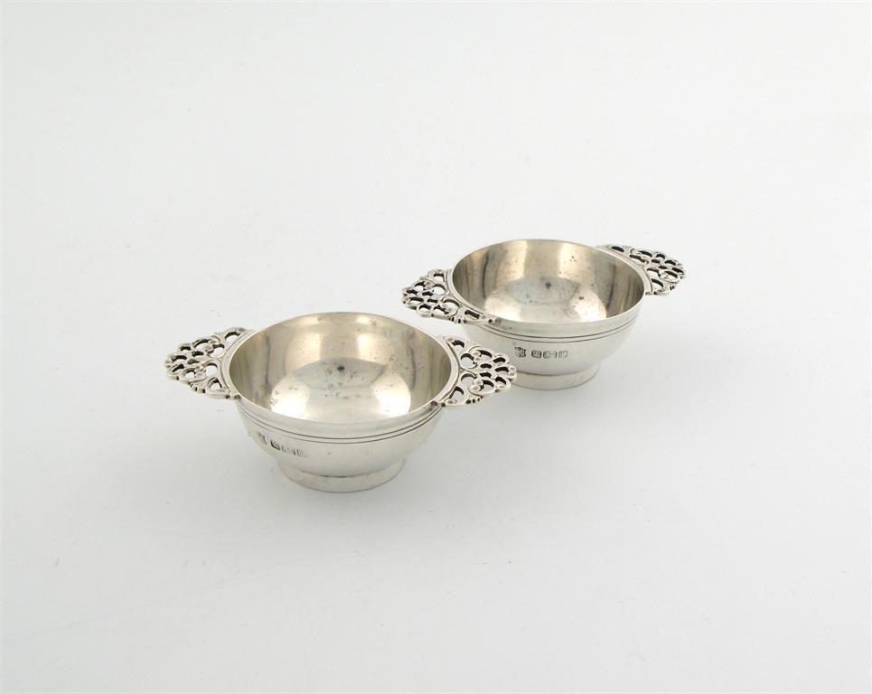 Appraisal: A pair of Edwardian silver miniature quaiches