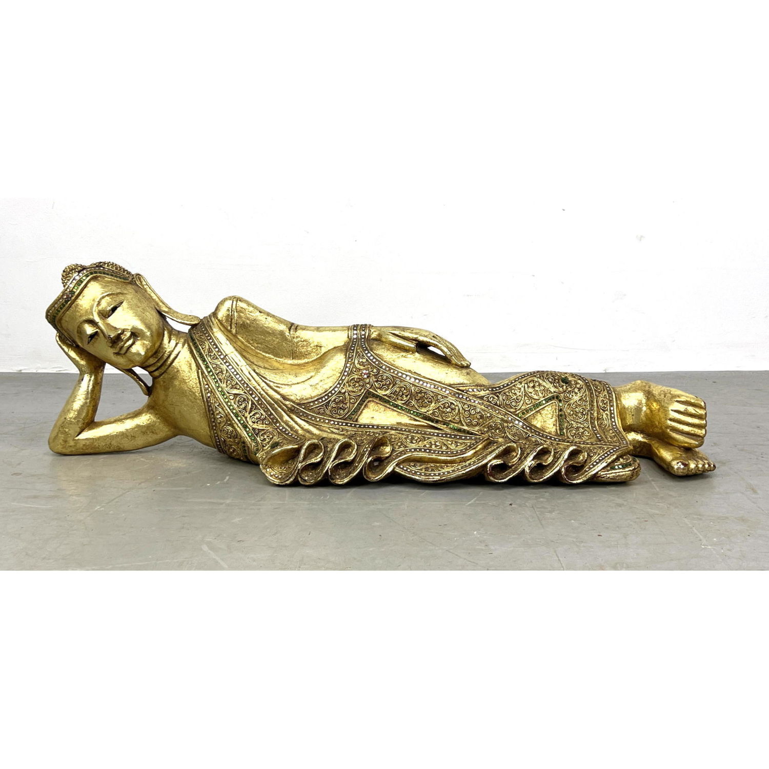 Appraisal: Carved Wood Gold Painted Reclining BUDDHA Sculpture Inset mirrored trim