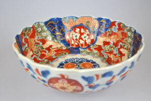 Appraisal: A Japanese Imari scalloped bowl decorated with floral panels cm