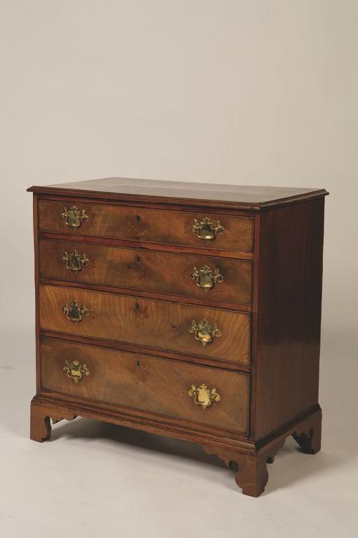 Appraisal: A GEORGE III MAHOGANY CHEST OF DRAWERS the rectangular top